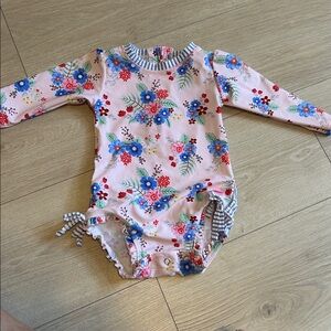 RUFFLEBUTTS Floral Long Sleeve Swimsuit